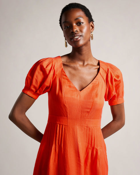 OPALZ-Dresses-OPALZ is classy, comfy and effortlessly cool. Featuring a low back, puff sleeves and pockets, this midi dress is the perfect holiday dress. Whether you're strolling along the sun-kissed beaches or enjoying a leisurely brunch in a picturesque coastal town, this dress is the perfect companion for your holiday adventures. Is that the South of France calling? If you are between sizes we recommend sizing up for this product. Midi dress Short puff sleeves Cupro, lyocell and linen No stretch with a f